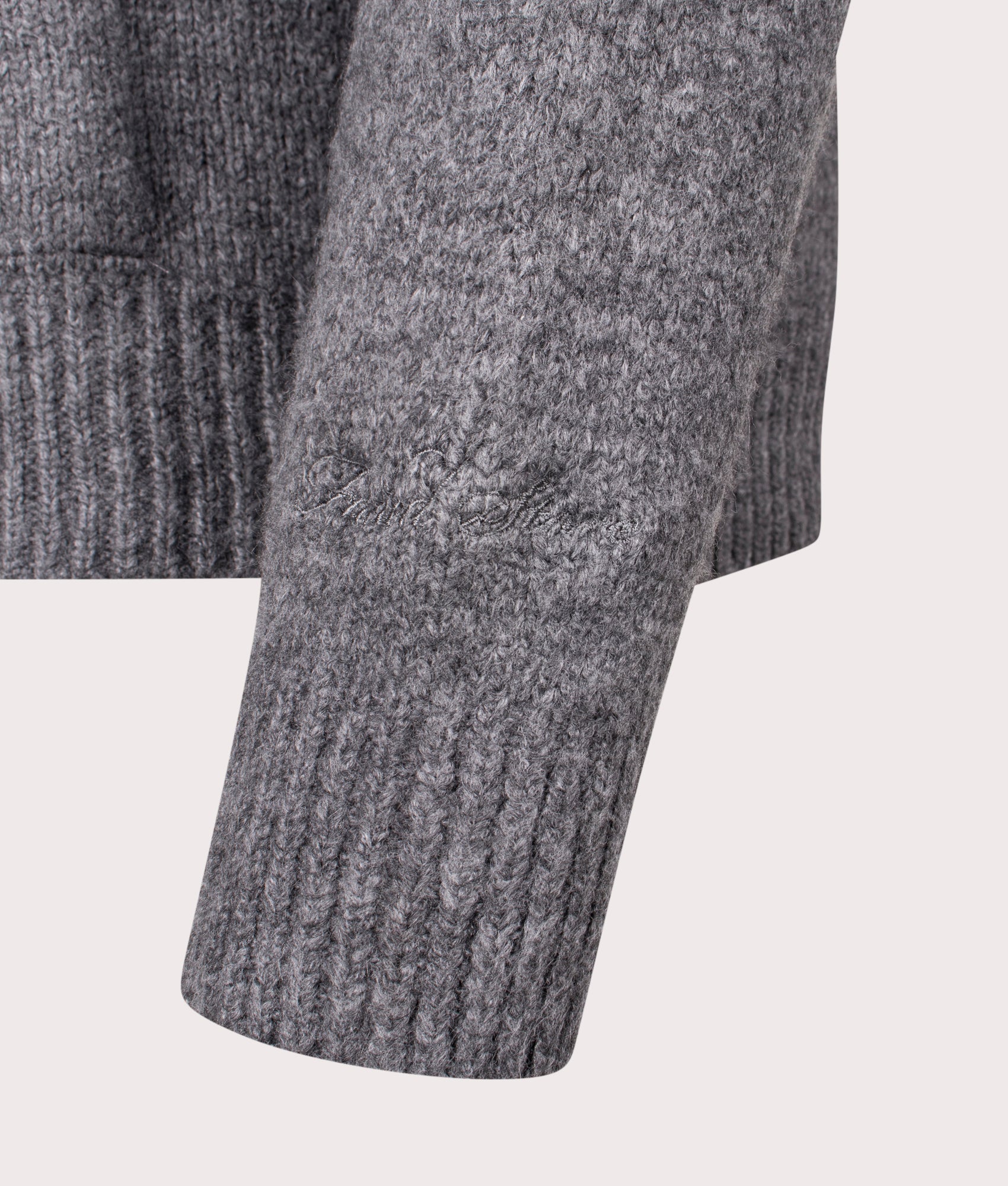 FADED Knitted Full Zip Hoodie in Charcoal Marl at EQVVS Menswear. Detail shot.