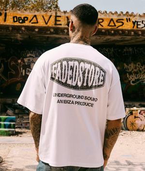 FADED Oval T-Shirt in white at EQVVS Menswear. Campaign shot.