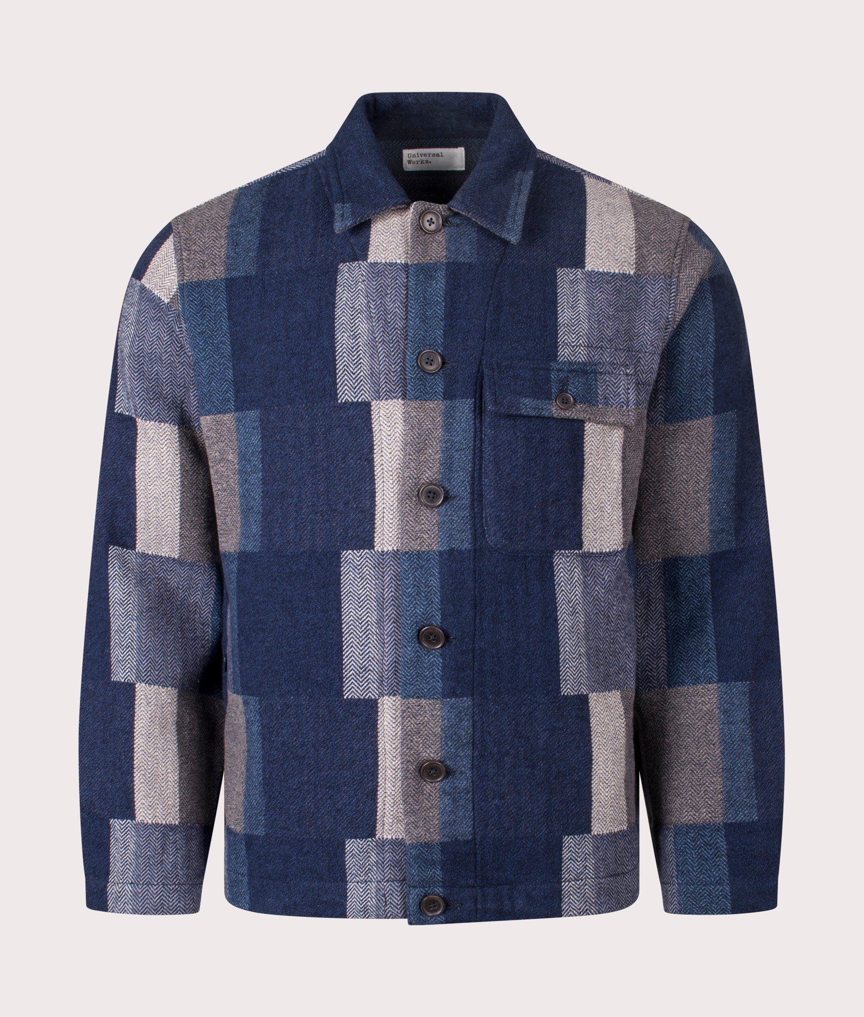 Universal Works Japanese Patchwork Tech Overshirt in Navy at EQVVS Menswear. Front shot.