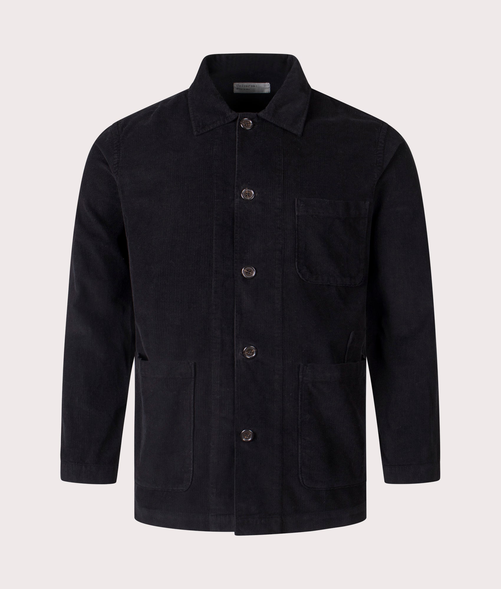 Universal Works Bakers Overshirt in Black at EQVVS Menswear. Front shot.