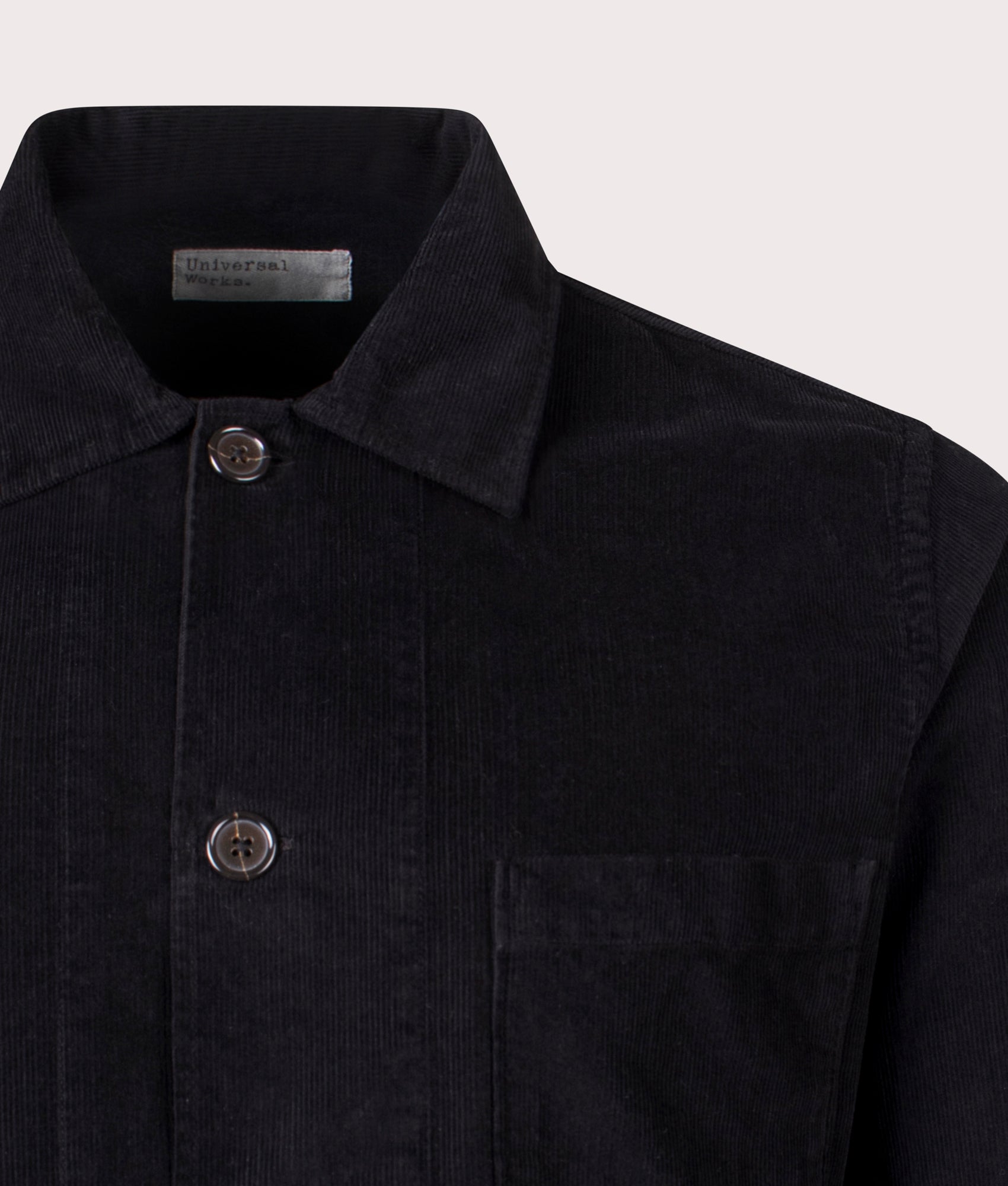 Universal Works Bakers Overshirt in Black at EQVVS Menswear. Detail shot. 
