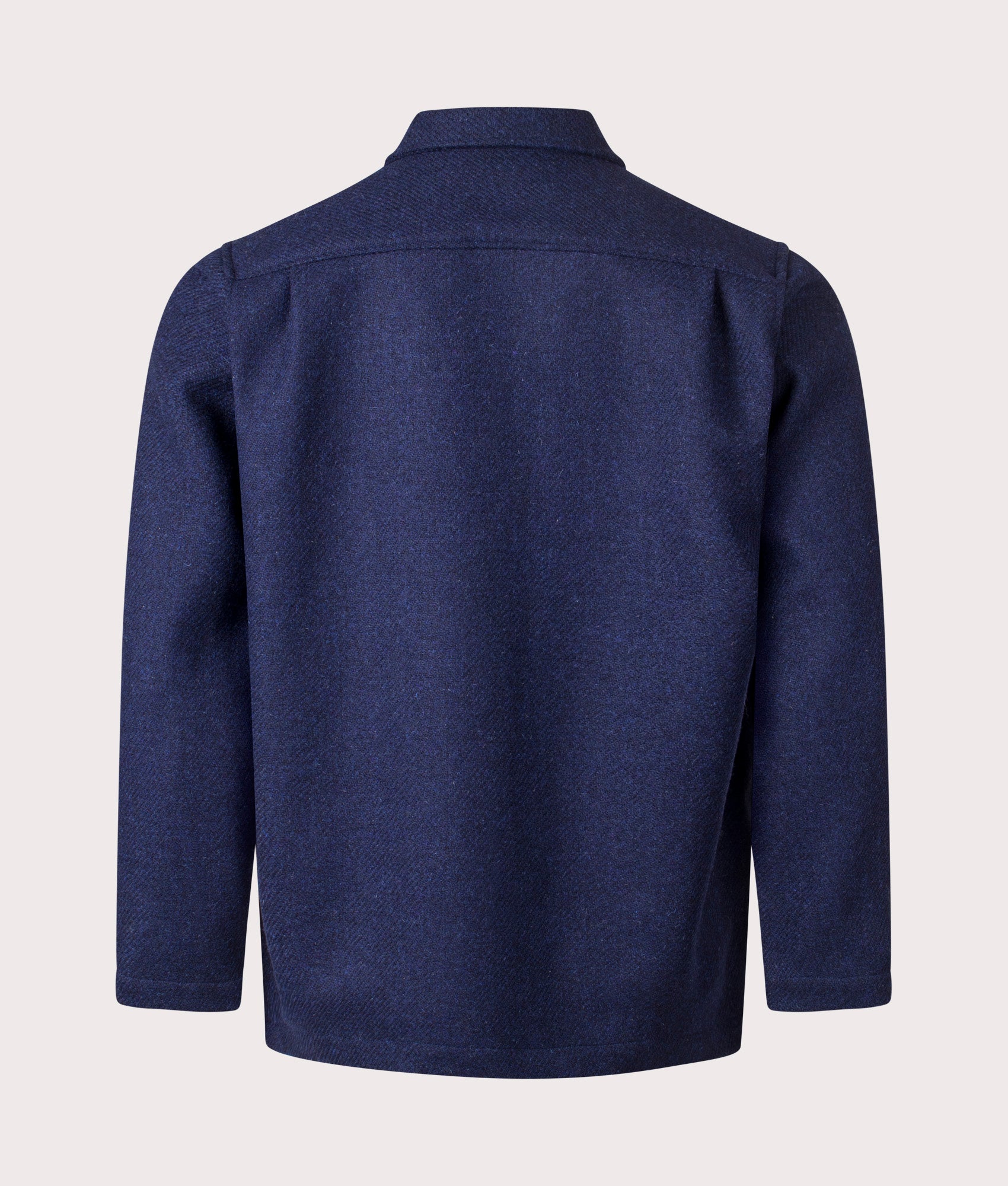 Universal Works Harris Tweed Easy Jacket in Indigo at EQVVS Menswear. Model back shot.