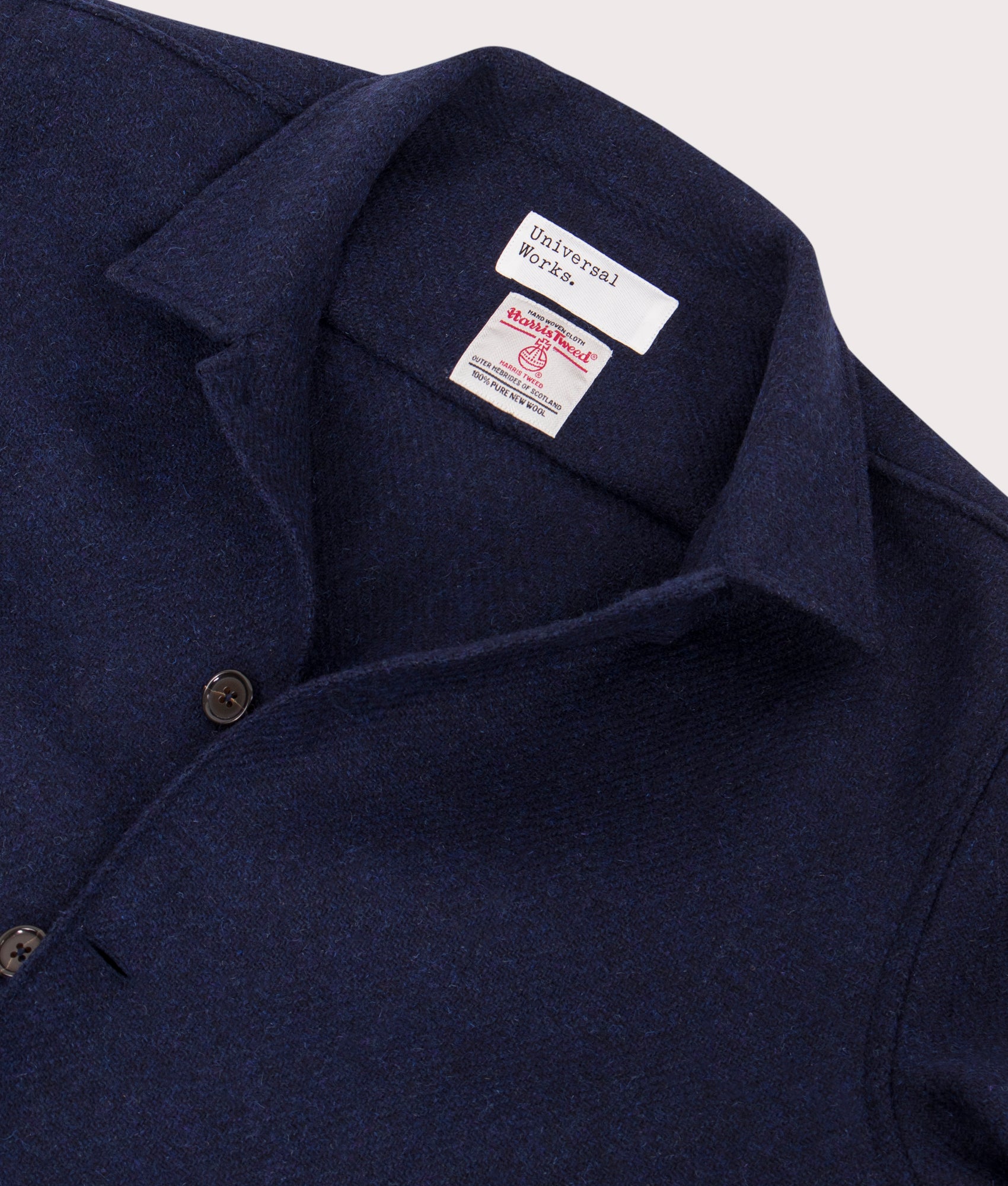Universal Works Harris Tweed Easy Jacket in Indigo at EQVVS Menswear. Detail shot.