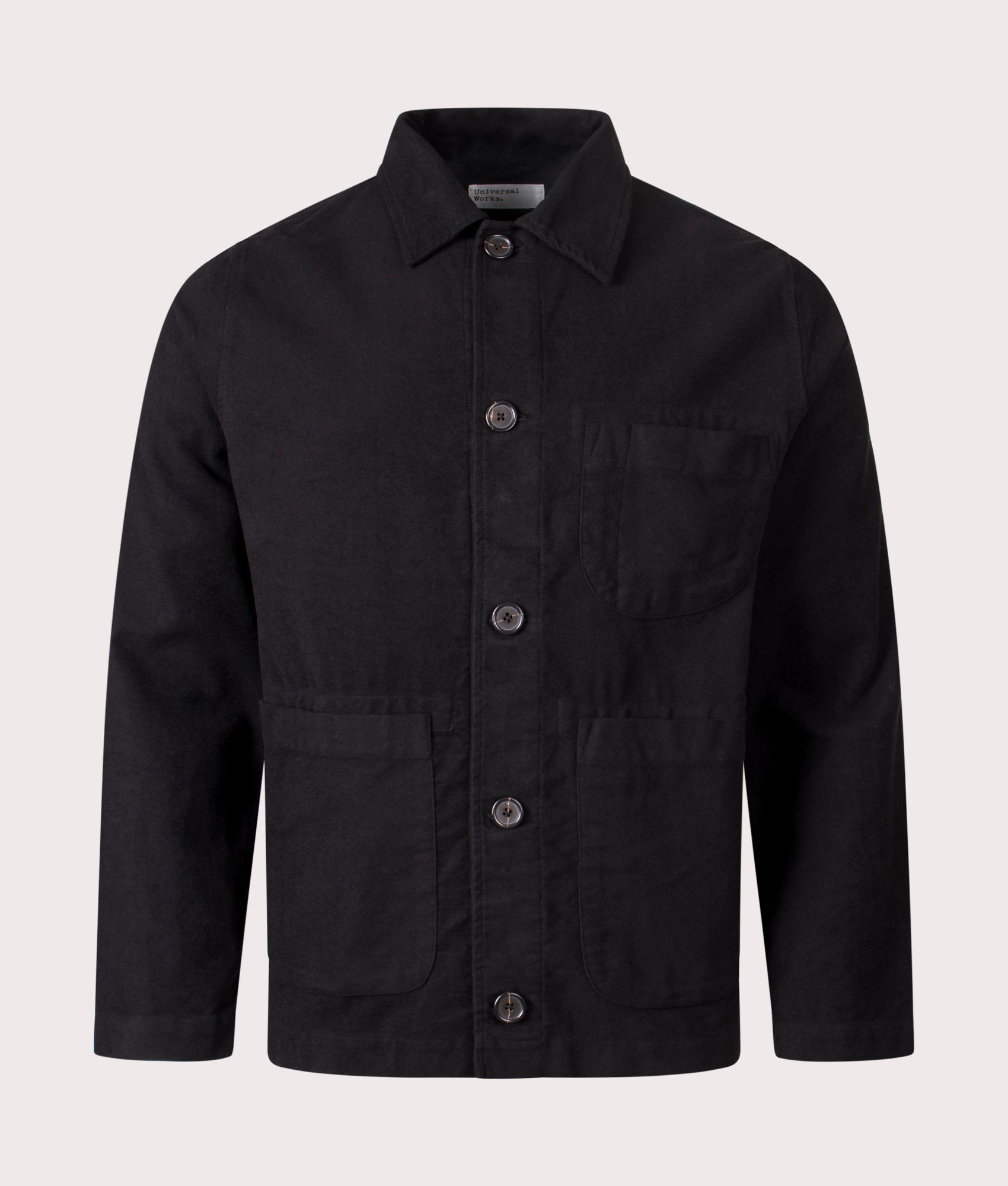 Universal Works Comfort Moleskin Field Jacket in Black at EQVVS Menswear. Front shot.