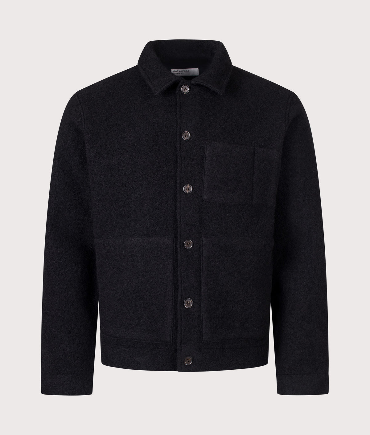 Universal Works Uniform Jacket in Black at EQVVS Menswear. Front shot.