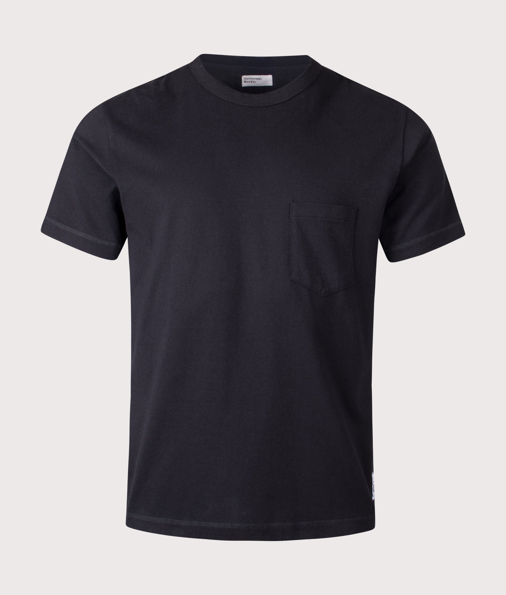 Universal Works Relaxed Fit Core Pocket T-Shirt in Black at EQVVS Menswear. Front shot.
