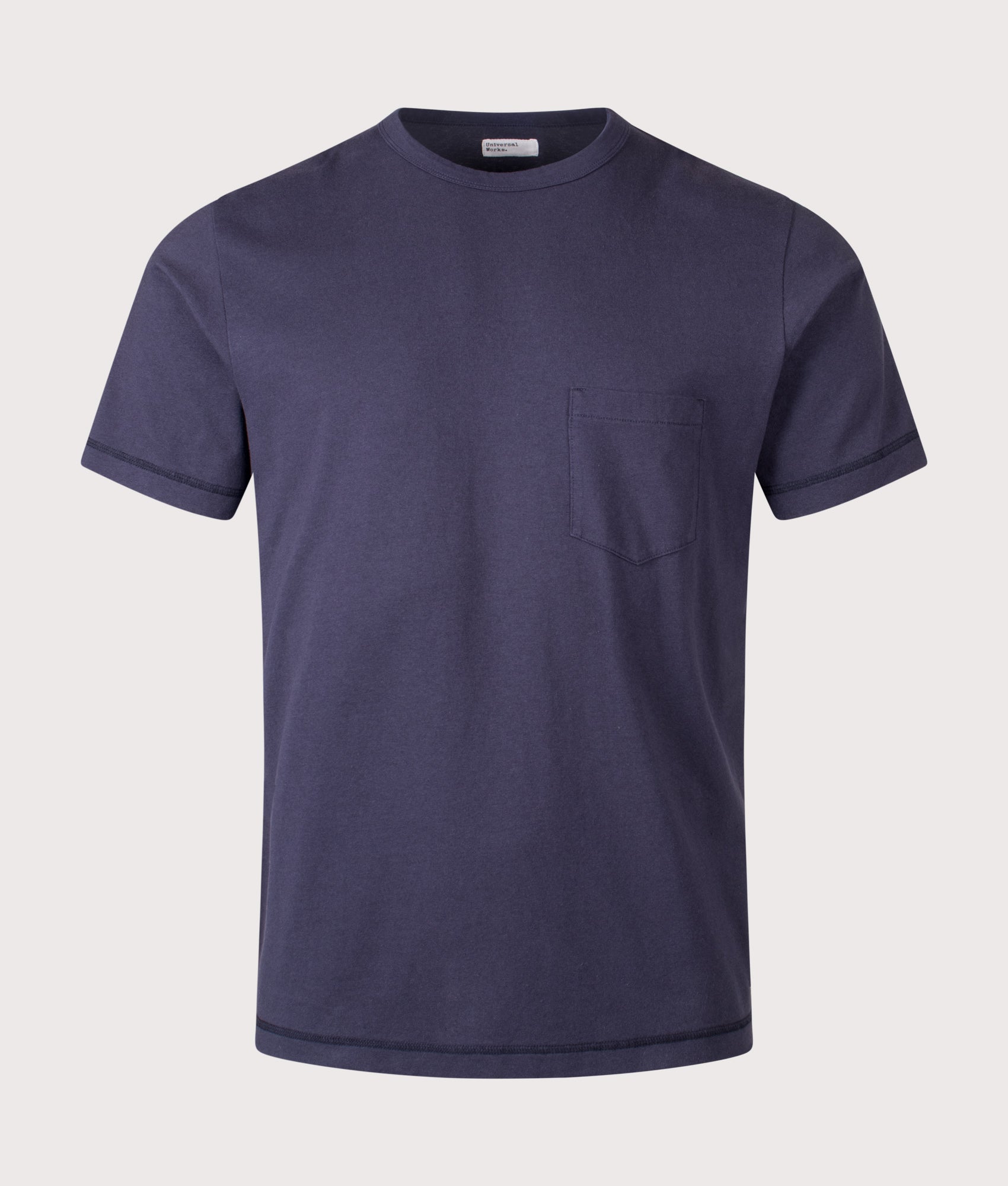 Universal Works Relaxed Fit Core Pocket T-Shirt in Navy at EQVVS Menswear. Front shot.