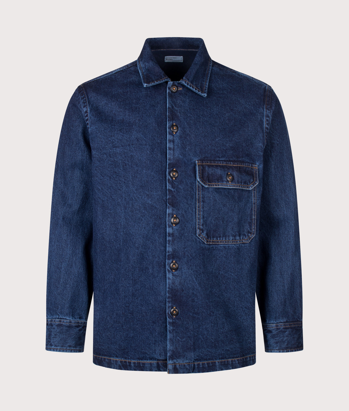 Universal Works Relaxed Fit Fatigue Shirt in Indigo at EQVVS Menswear. Front shot.