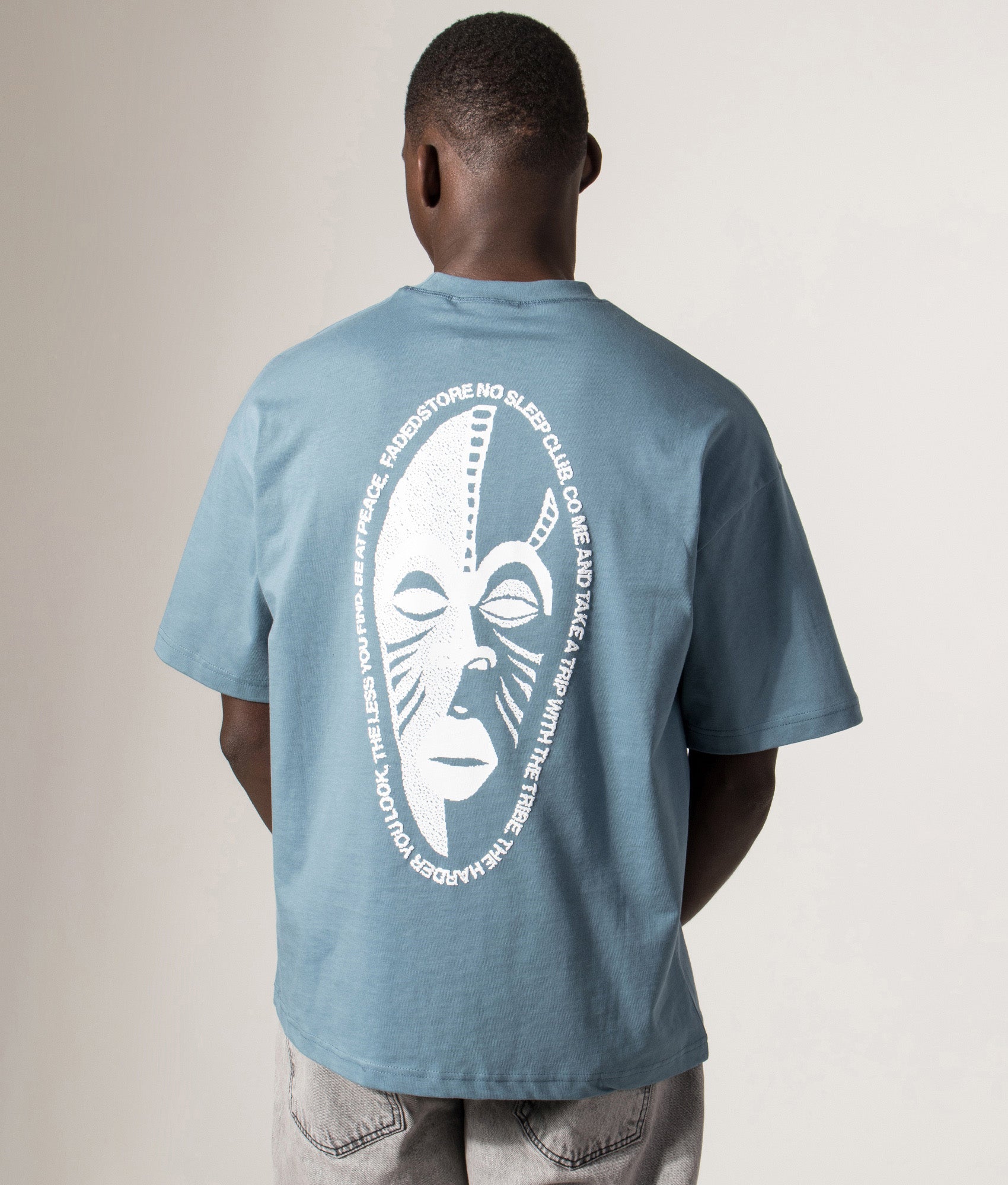 Faded Relaxed Fit NSC Face T-Shirt in Basalt at EQVVS Menswear. Model back shot.