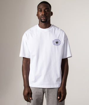 Faded Relaxed Fit NSC Circle Eye T-Shirt in White at EQVVS Menswear. Model front shot.