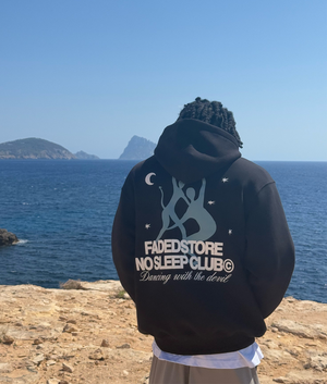 Faded Relaxed Fit NSC Devil Hoodie in Black at EQVVS Menswear. Model campaign shot.