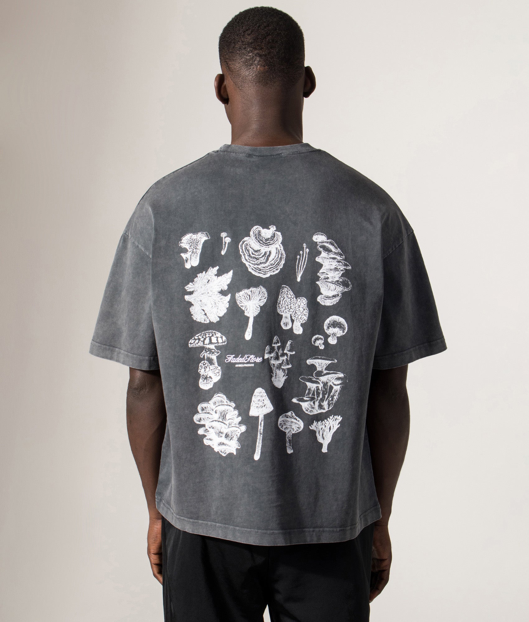 FADED Relaxed Fit Mushroom Sketch T-Shirt in Washed Black at EQVVS Menswear. Model back shot.