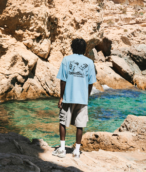 FADEDSTORE Relaxed Fit Take The Gamble T-Shirt in Dusky Blue at EQVVS Menswear. Campaign shot.