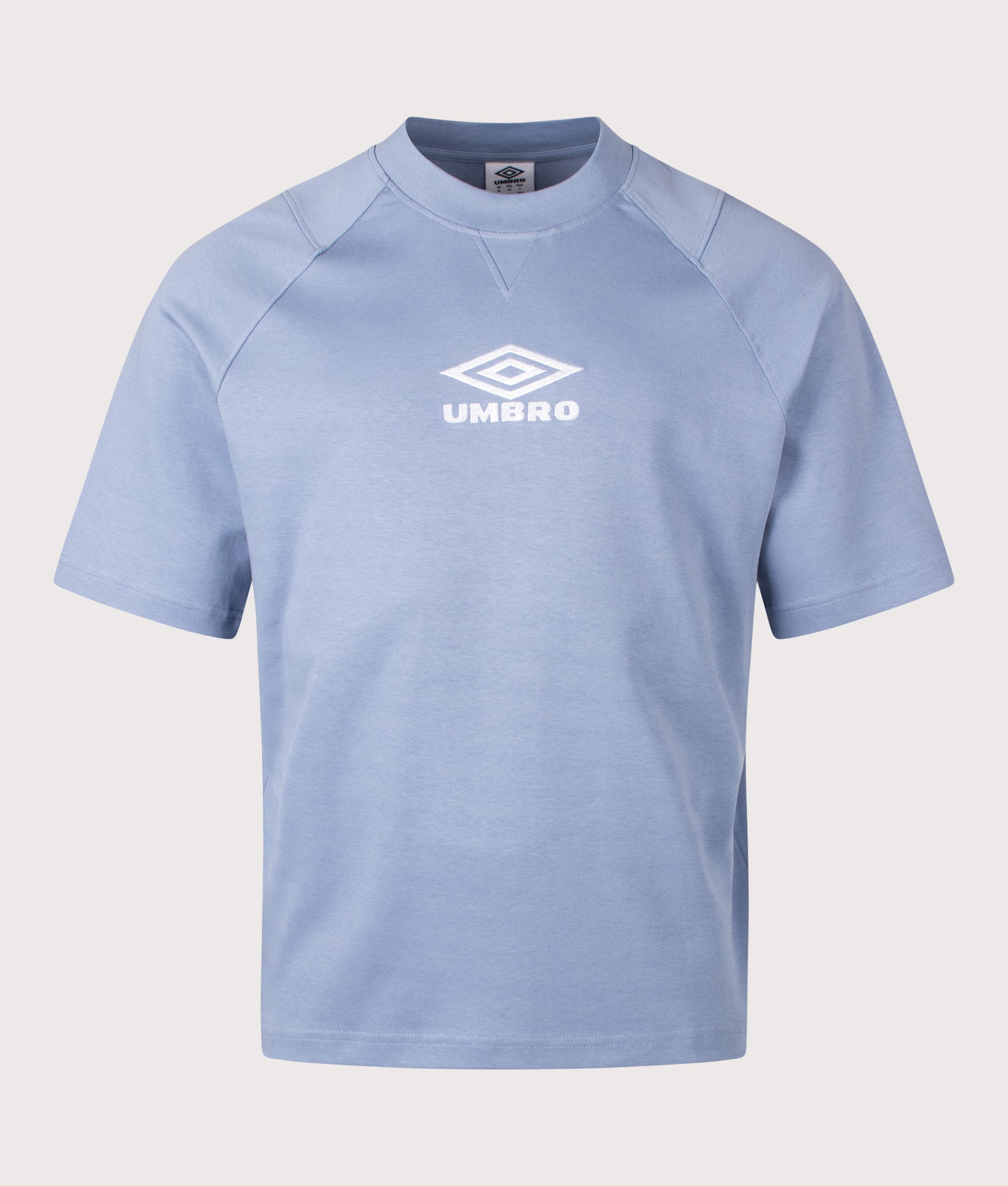 Umbro Iconic Boxy T-Shirt in Infinity and Brilliant White at EQVVS Menswear. Front shot.