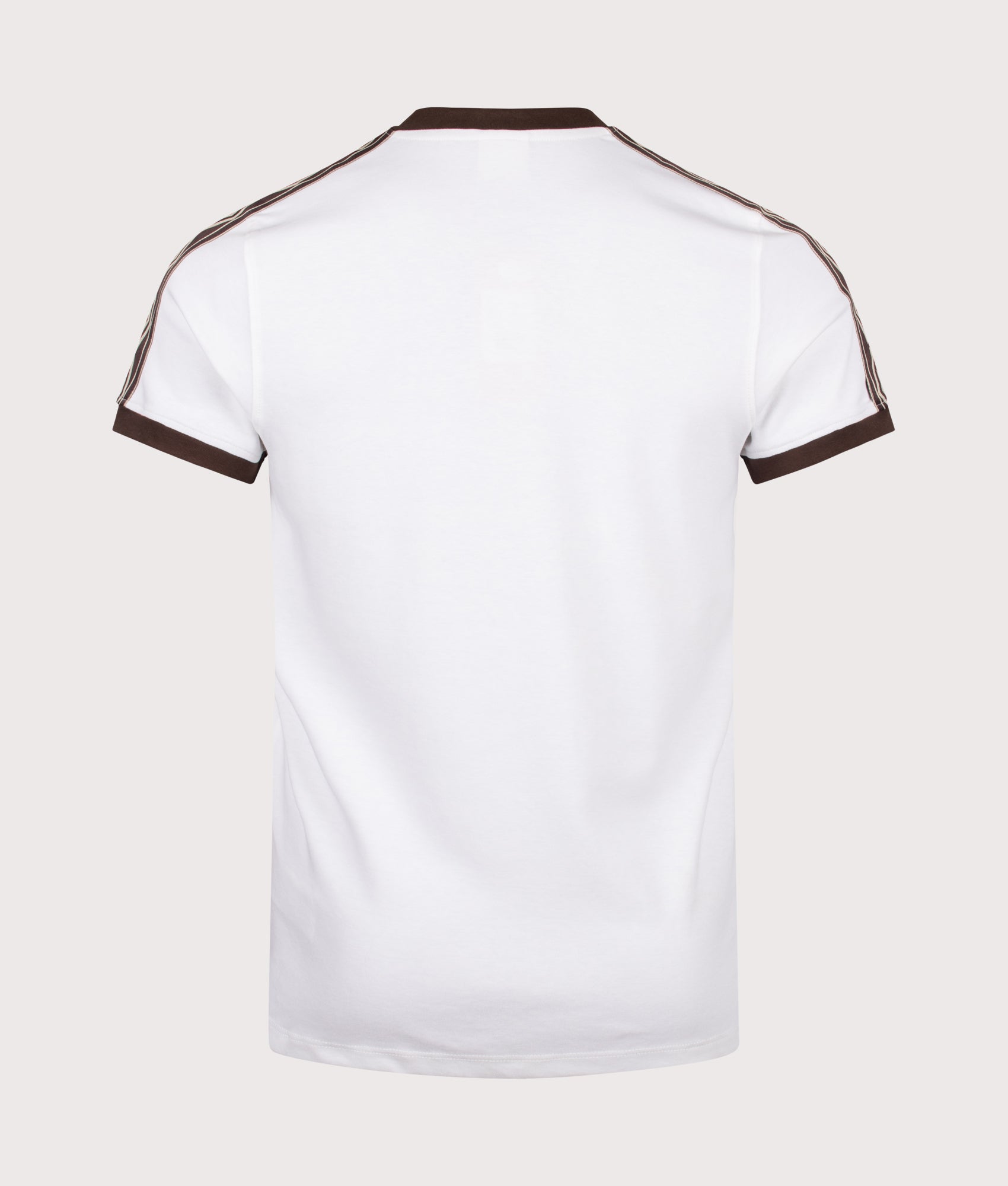 Umbro Taped T-Shirt in Brilliant White and Demitasse at EQVVS Menswear. Back shot.