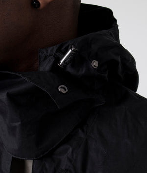 A-COLD-WALL Modular Gilet in onyx hood detail shot at EQVVS