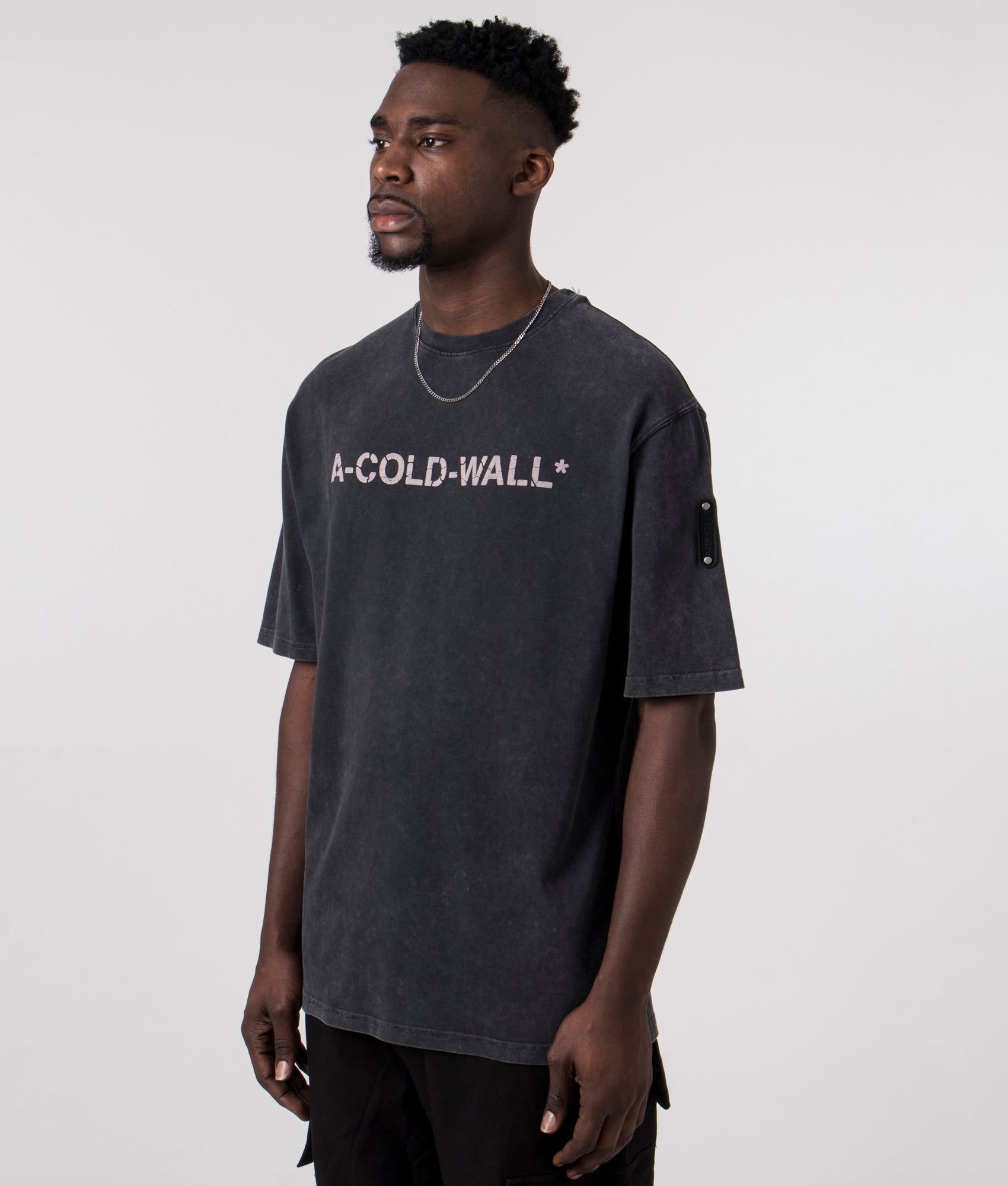 A-COLD-WALL Overdye Logo T-Shirt in onyx side front shot at EQVVS