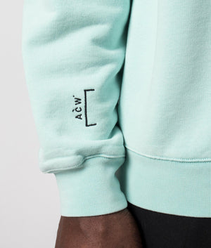 A-COLD-WALL Essential Sweatshirt in faded turquoise detail sleeve shot at EQVVS