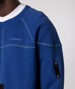 A-COLD-WALL Intersect Sweatshirt in volt blue arm detail shot at EQVVS