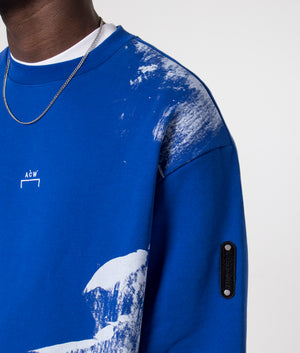 A-COLD-WALL Brushstroke Sweatshirt in volt blue arm detail shot at EQVVS