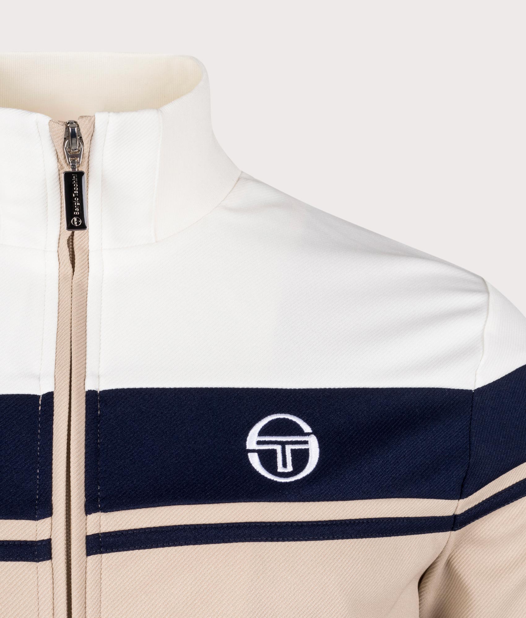 Damarindo Track Top in Humus by Sergio Tacchini. EQVVS Detail Shot.