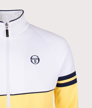 Orion Track Jacket by Sergio Tacchini in White/Lemon Drop/Maritime Blue. Shot by EQVVS. Detail shot.