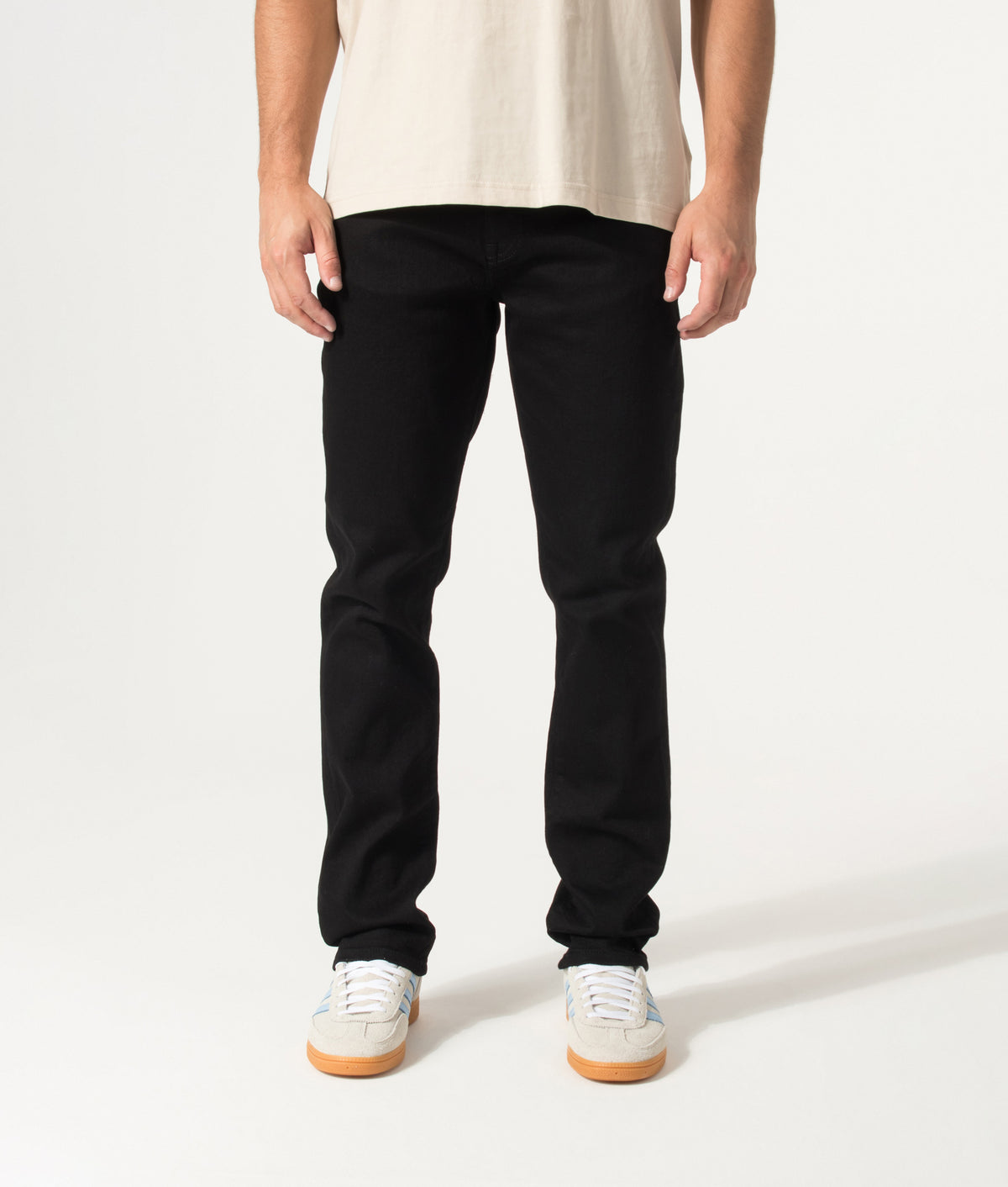 Belstaff Regular Fit B69 Jeans in Black at EQVVS Menswear. Model front shot.