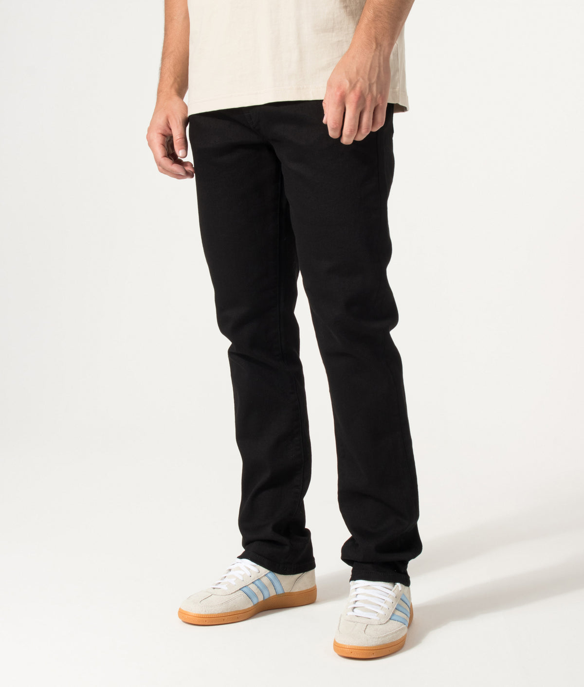 Belstaff Regular Fit B69 Jeans in Black at EQVVS Menswear. Angled model front shot.