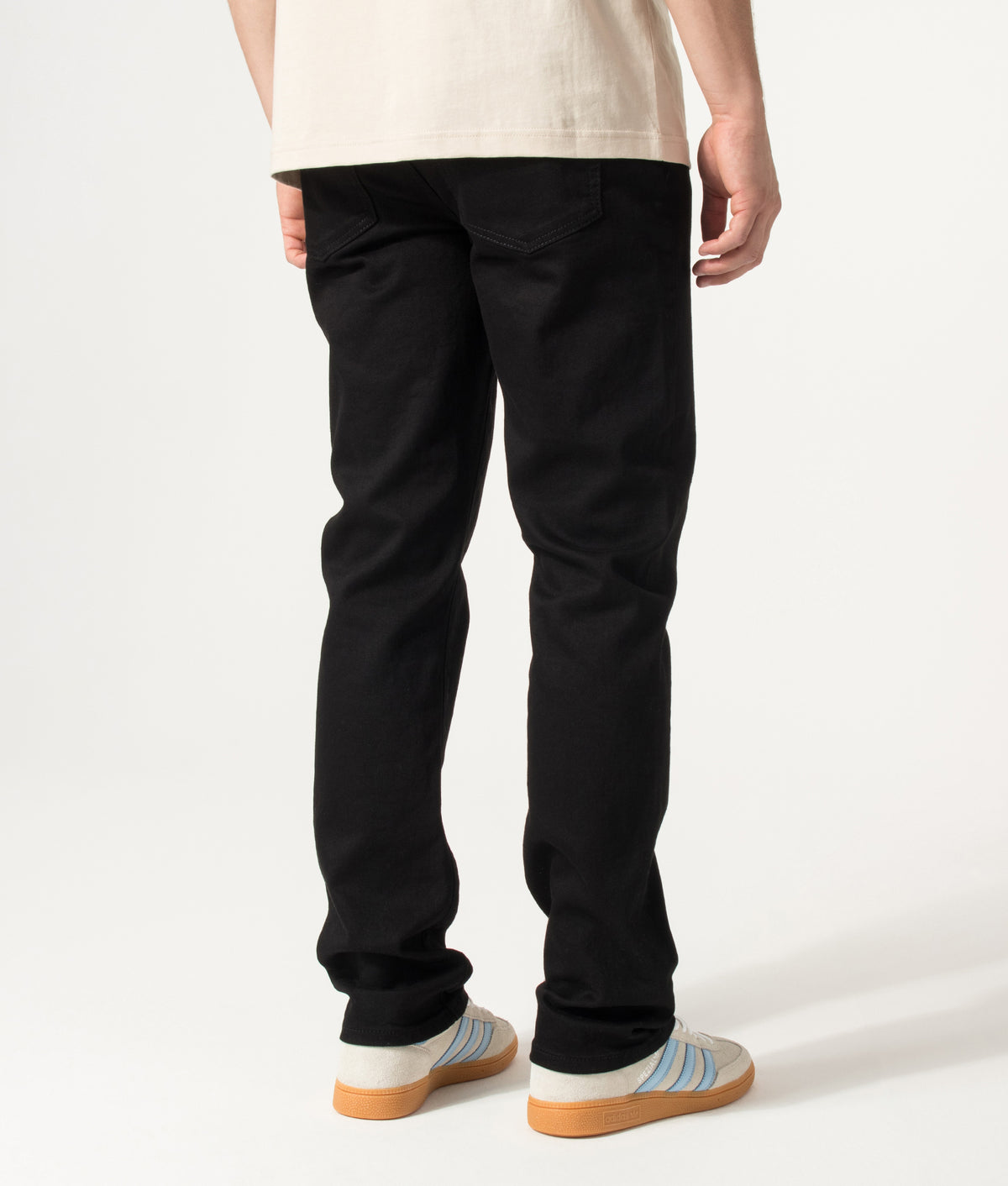 Belstaff Regular Fit B69 Jeans in Black at EQVVS Menswear. Angled model back shot.
