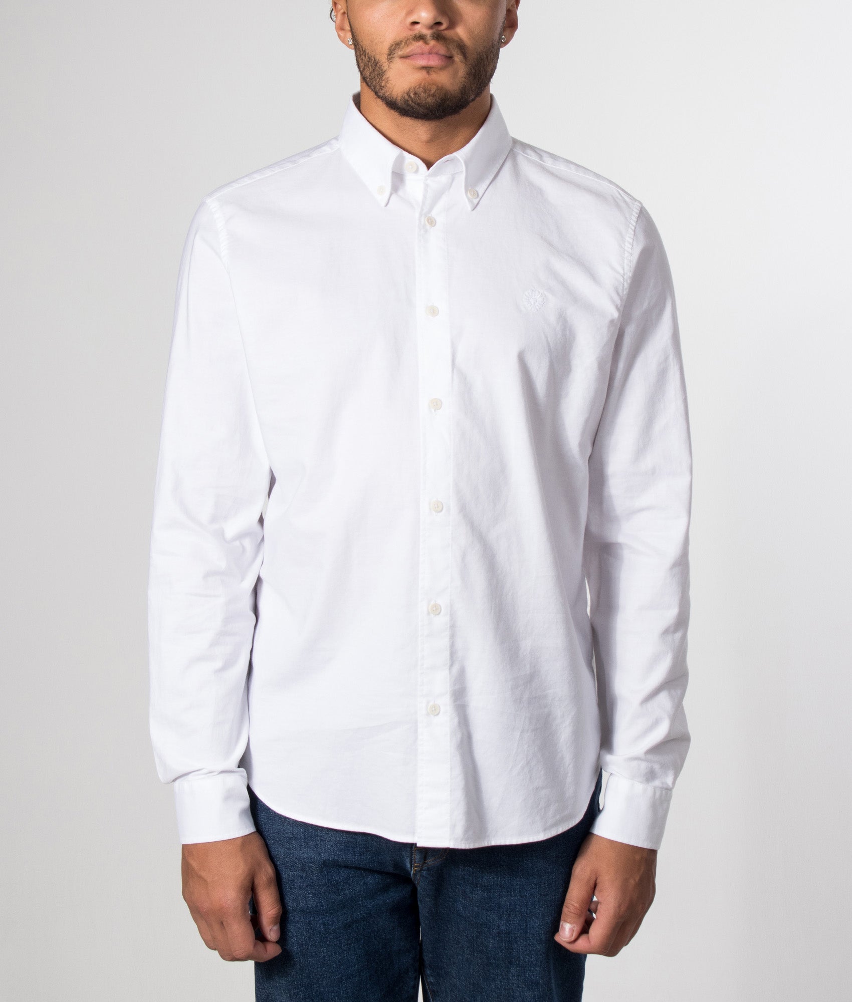 Belstaff Slim Fit Street Shirt in White at EQVVS Menswear. Model front shot.