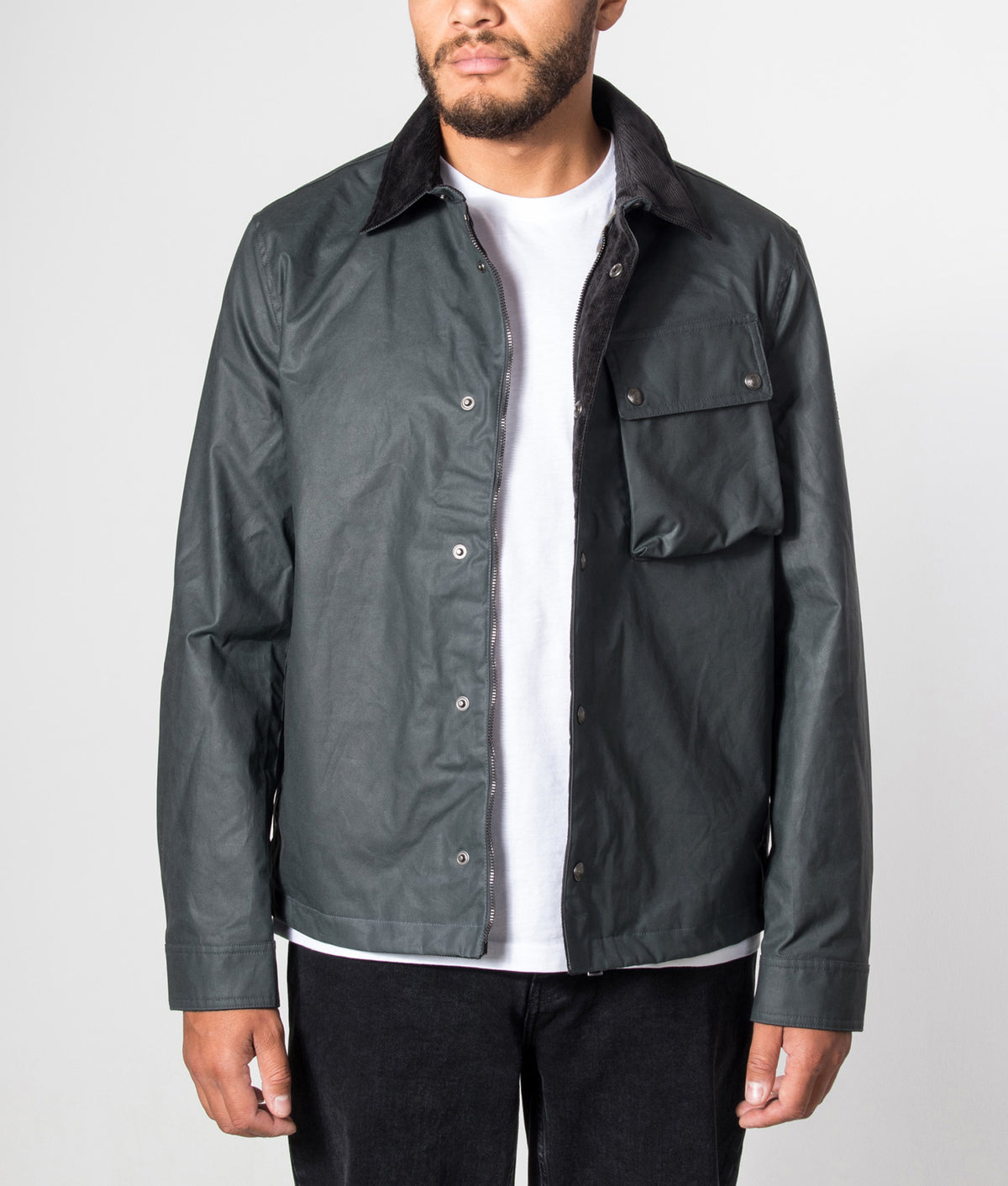 Belstaff Regular Fit Ground Jacket in Petrol at EQVVS Menswear. Model front shot.