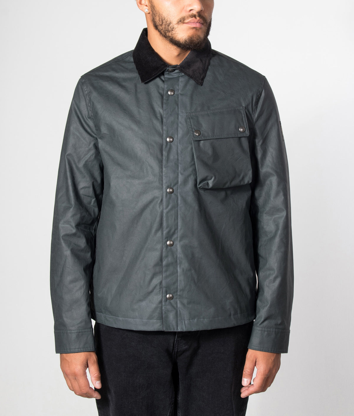 Belstaff Regular Fit Ground Jacket in Petrol at EQVVS Menswear. Model front shot.