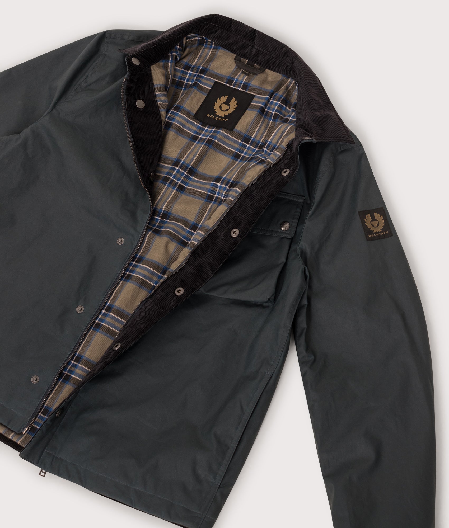 Belstaff Regular Fit Ground Jacket in Petrol at EQVVS Menswear. Flat shot.