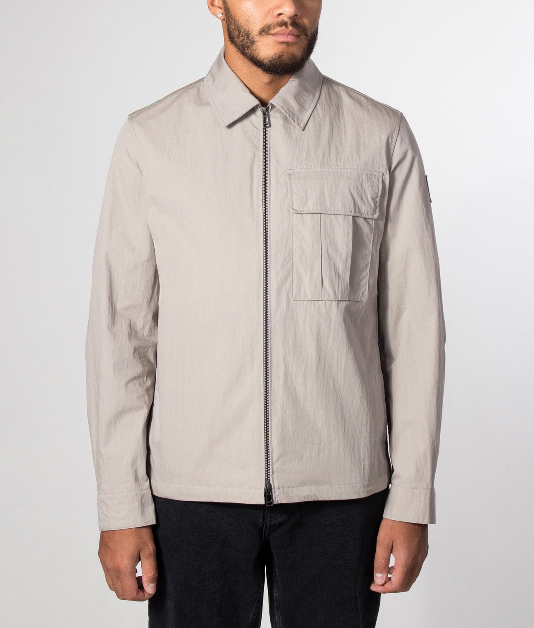 Belstaff Regular Fit Cargo Overshirt in Concrete at EQVVS Menswear. Model front shot.