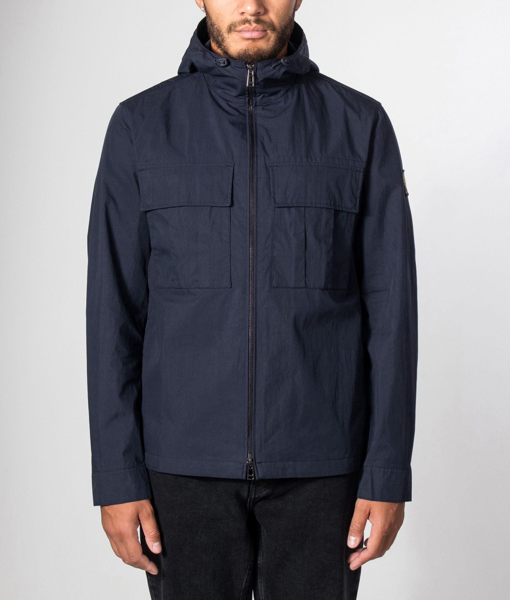Belstaff Regular Fit Container Overshirt in Dark Ink at EQVVS Menswear. Model front shot.