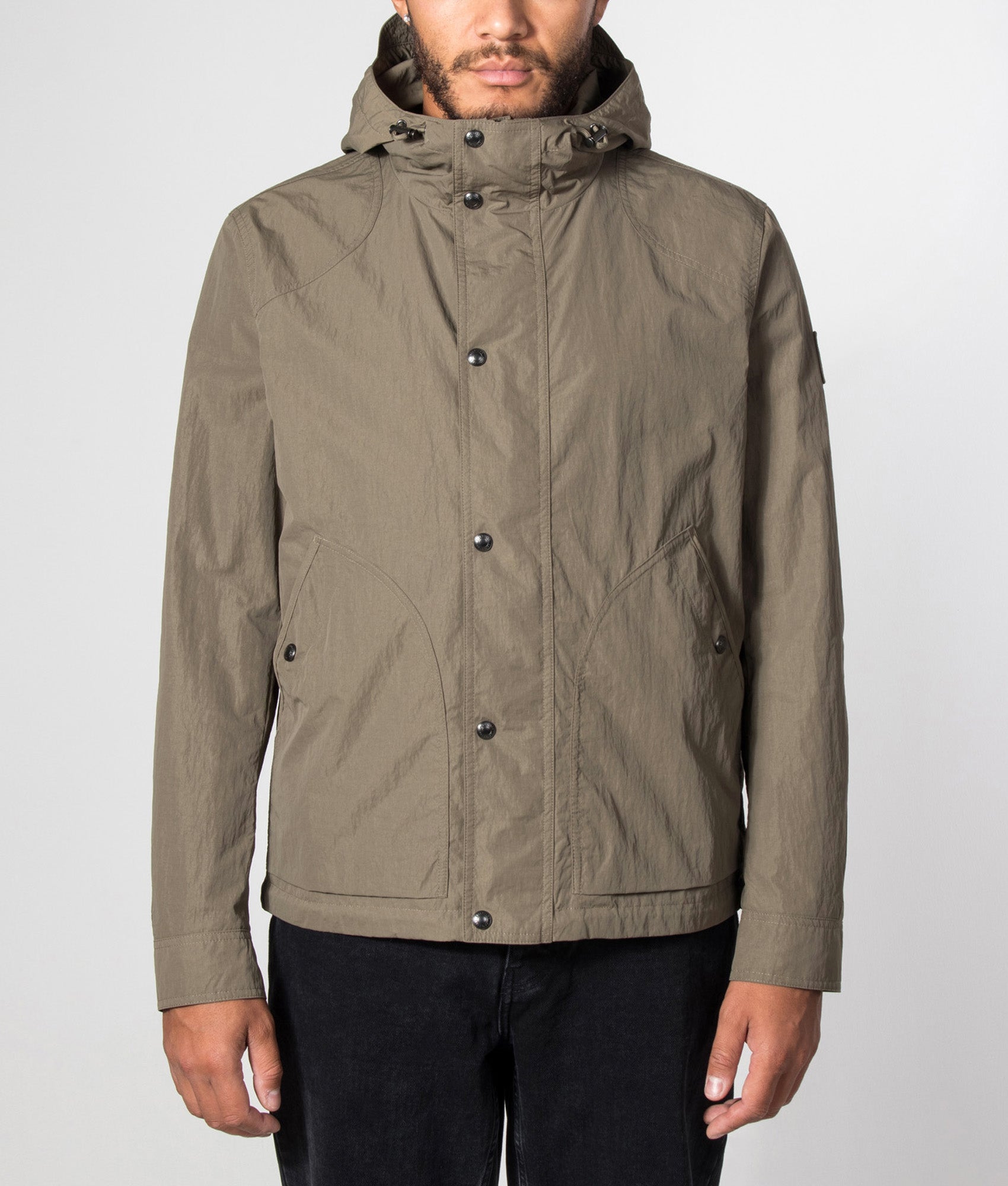 Belstaff Regular Fit Marsh Jacket in Khaki Green at EQVVS Menswear. Model front shot.