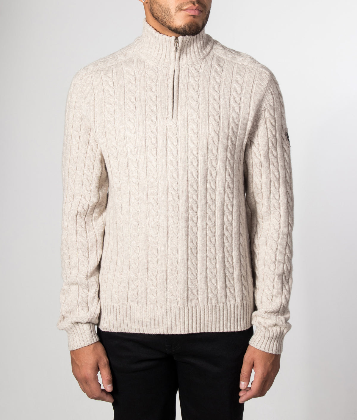 Belstaff Regular Fit Westport Quarter Zip Jumper in Pale Stone at EQVVS Menswear. Model front shot.
