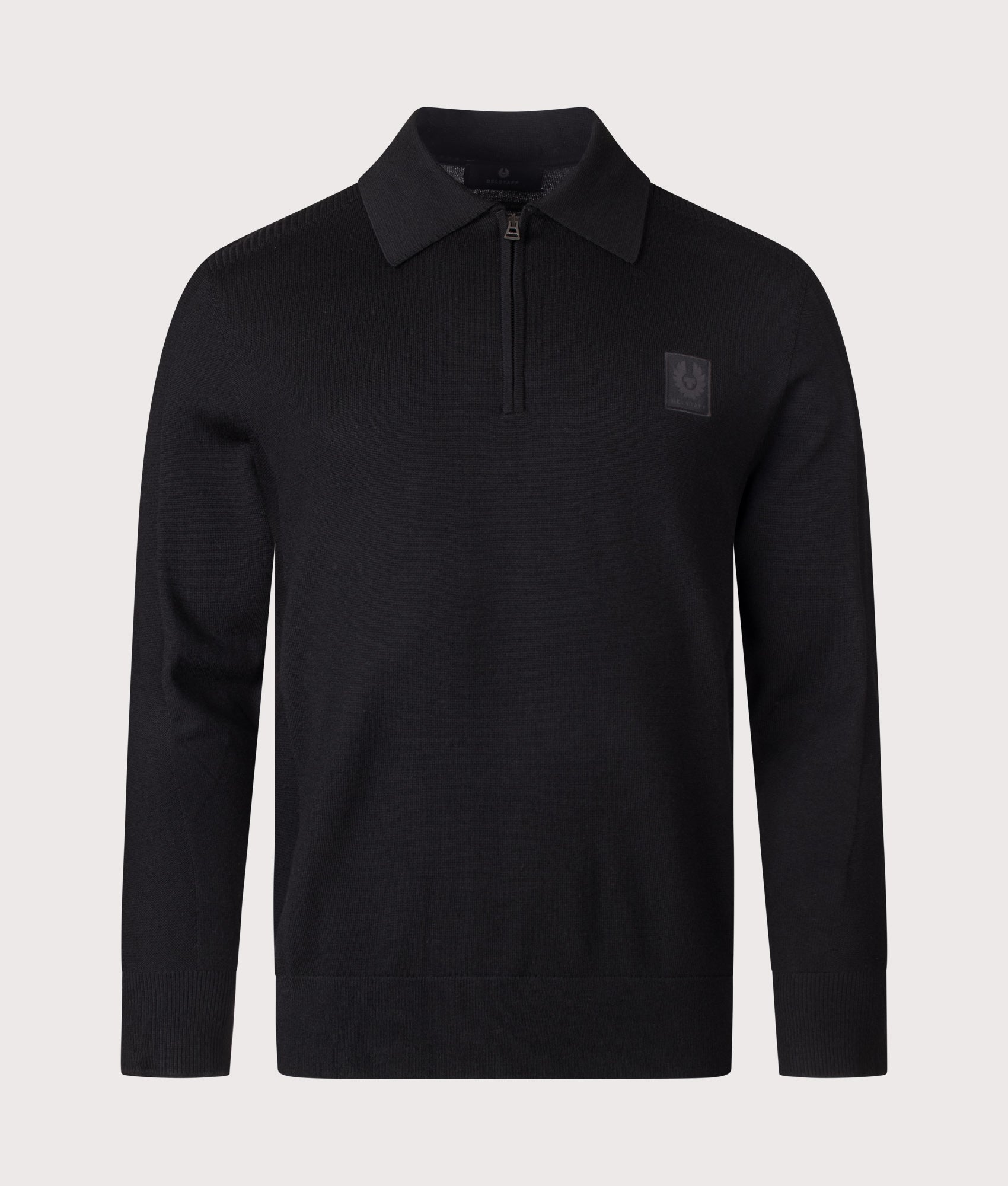 Belstaff Regular Fit Colden Knitted Polo Shirt in Black at EQVVS Menswear. Front shot.