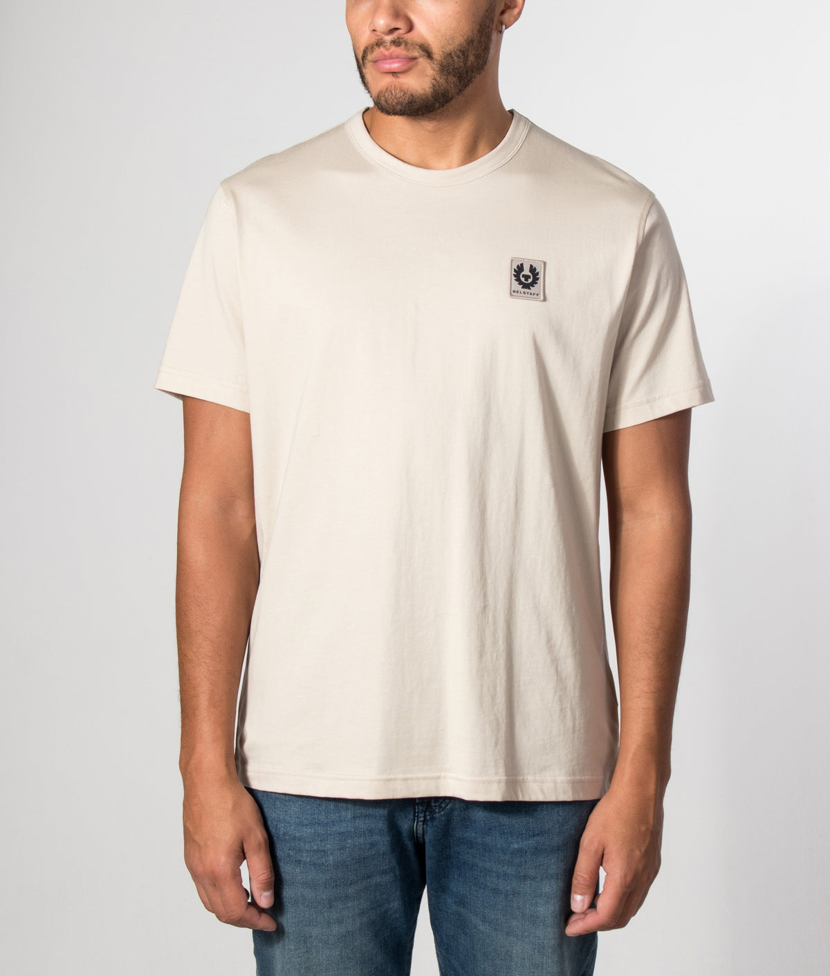 Belstaff Regular Fit Belstaff T-Shirt in Pale Stone at EQVVS Menswear. Model front shot.