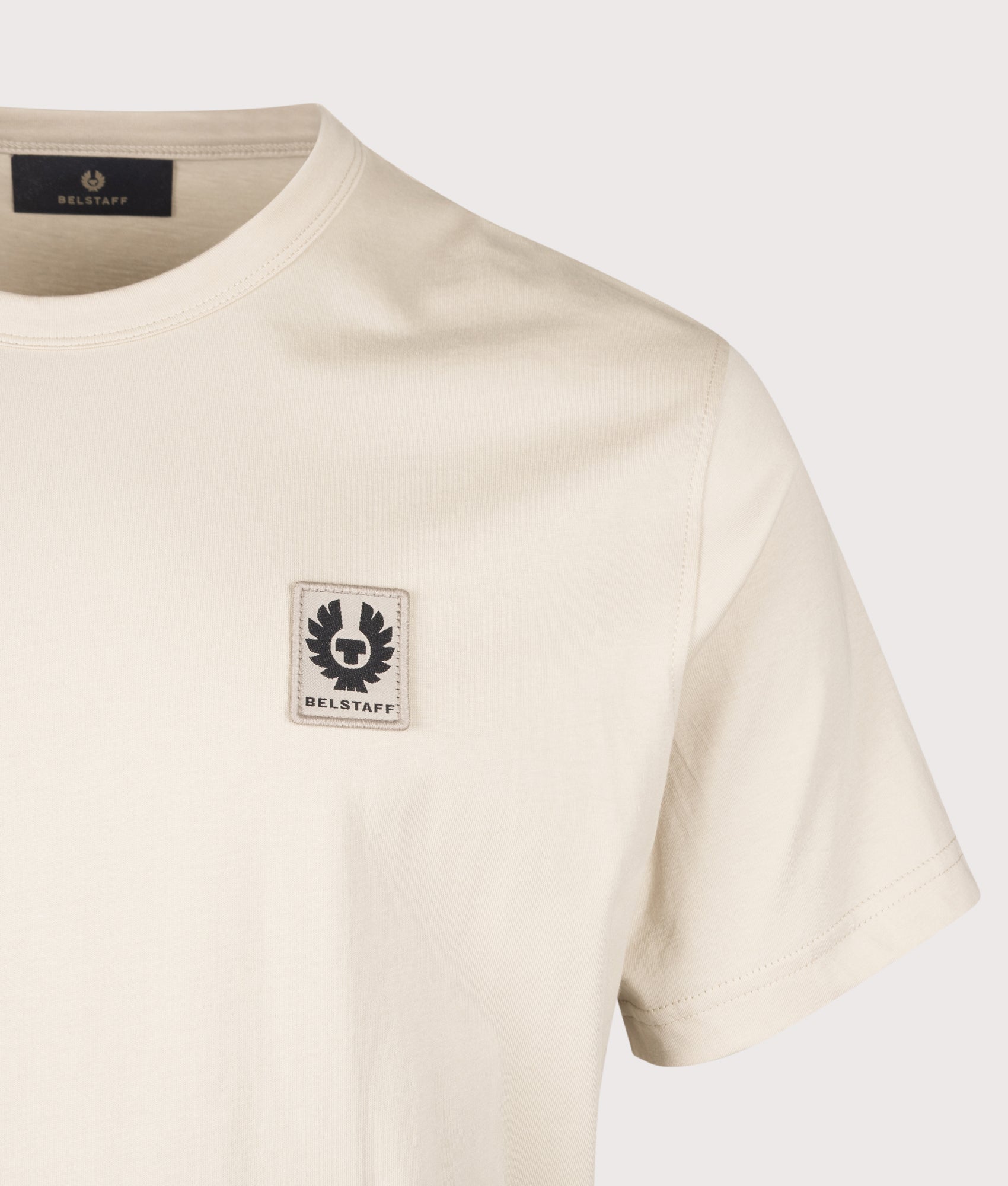 Belstaff Regular Fit Belstaff T-Shirt in Pale Stone at EQVVS Menswear. Detail shot.