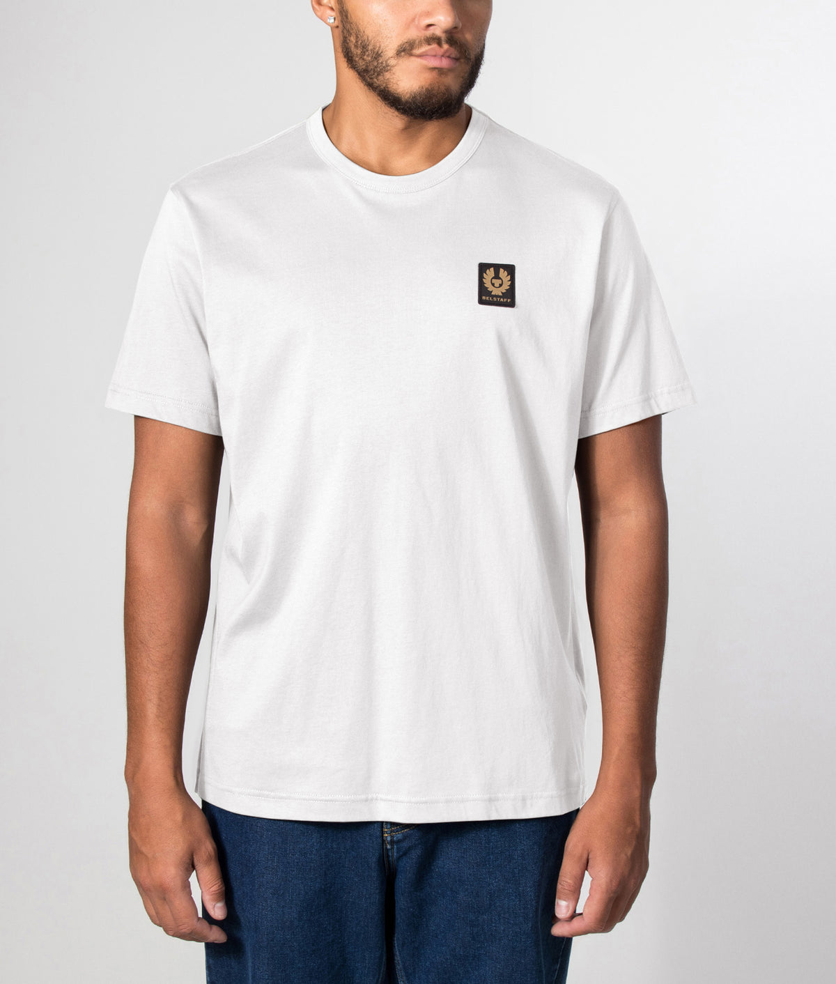 Belstaff Regular Fit Belstaff T-Shirt in White at EQVVS Menswear. Front model shot.