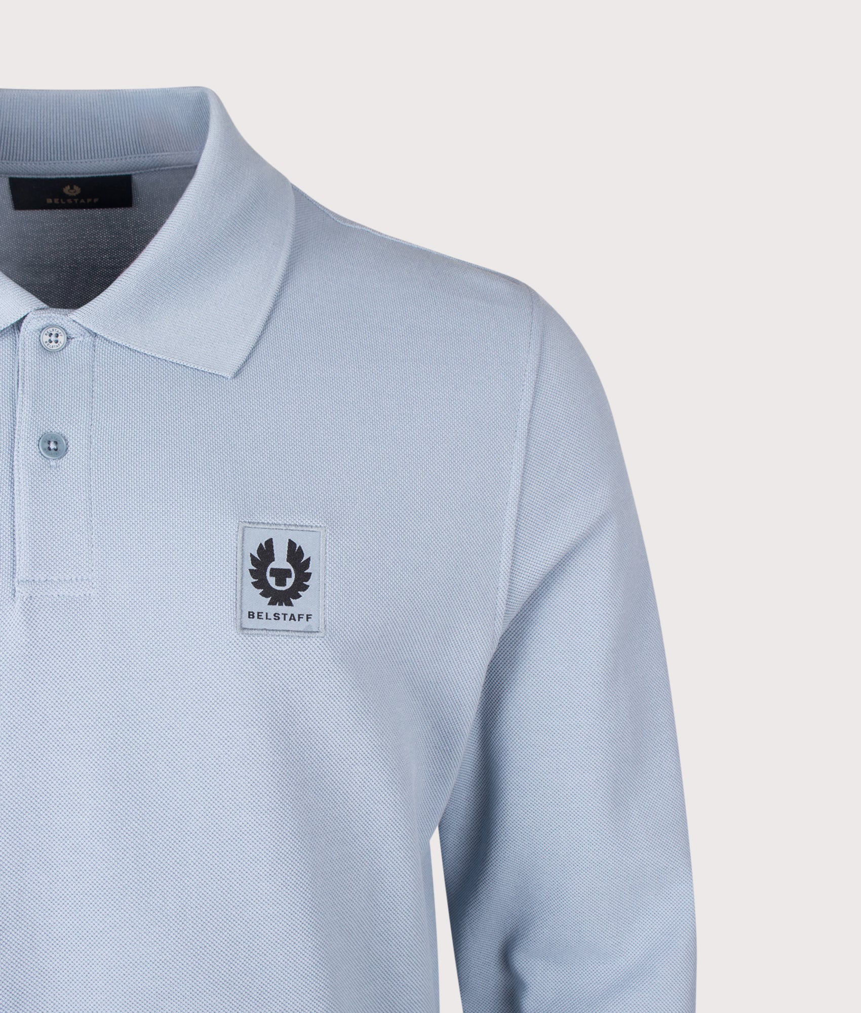 Belstaff Regular Fit Belstaff Long Sleeved Polo Shirt in Mist Blue at EQVVS Menswear. Detail shot.
