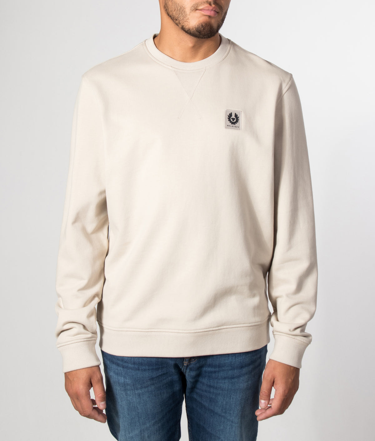 Belstaff Regular Fit Belstaff Sweatshirt in Pale Stone at EQVVS Menswear.  Model front shot.