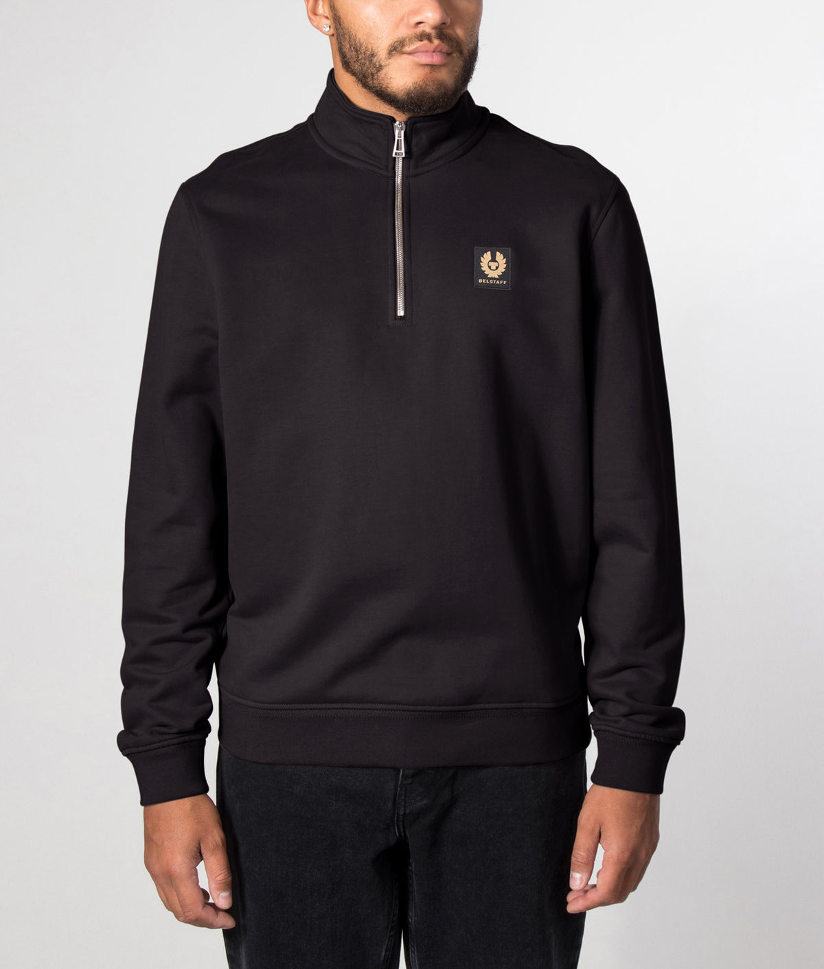 Belstaff Regular Fit Belstaff Quarter Zip Sweatshirt in Black at EQVVS Menswear. Front model shot.