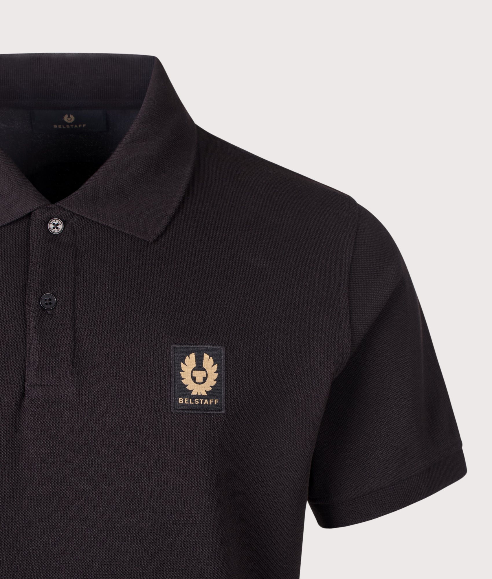 Belstaff Regular Fit Belstaff Polo Shirt in Black at EQVVS Menswear. Detail shot.