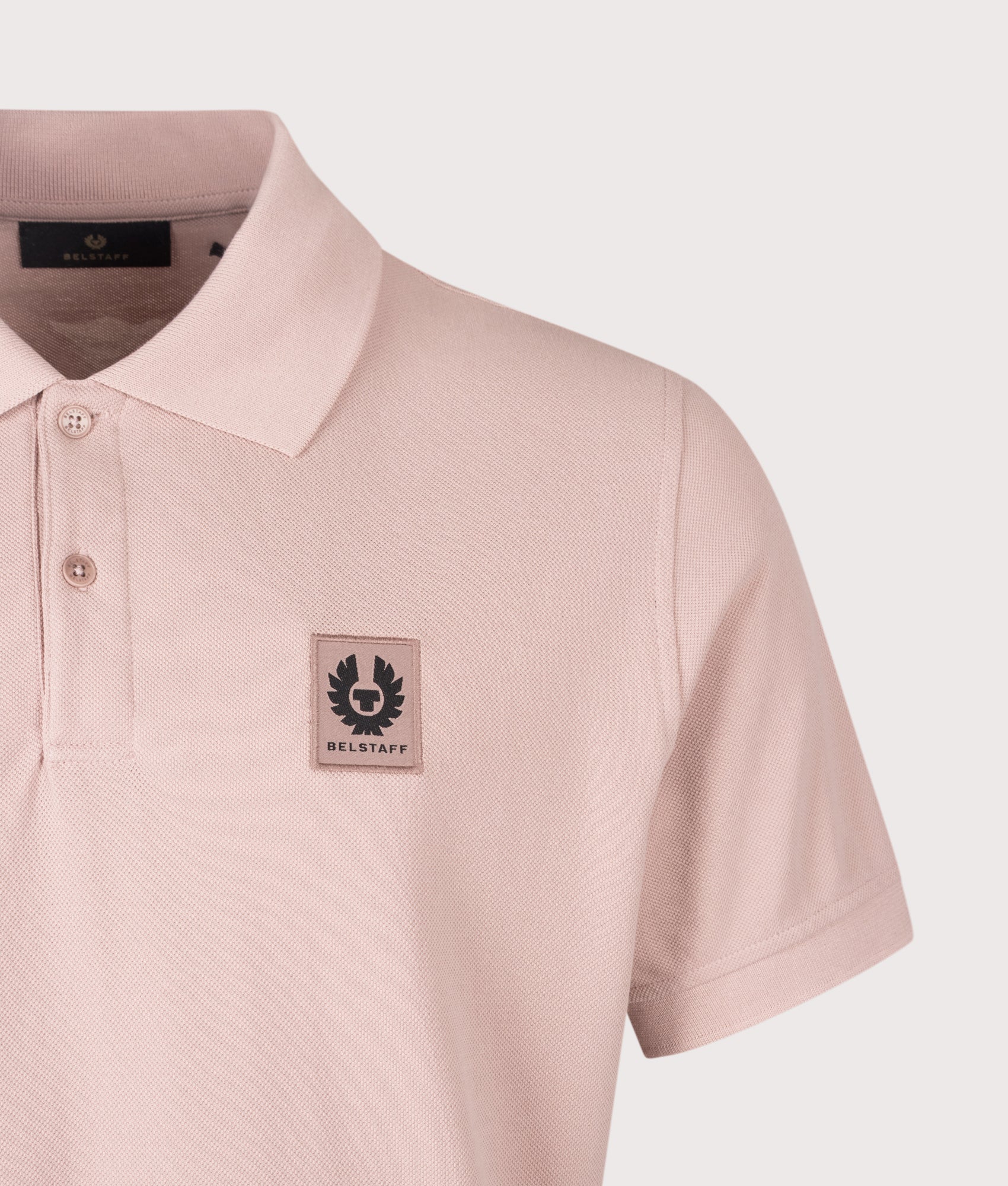 Belstaff Regular Fit Belstaff Polo Shirt in Dusk Pink at EQVVS Menswear. Detail shot.