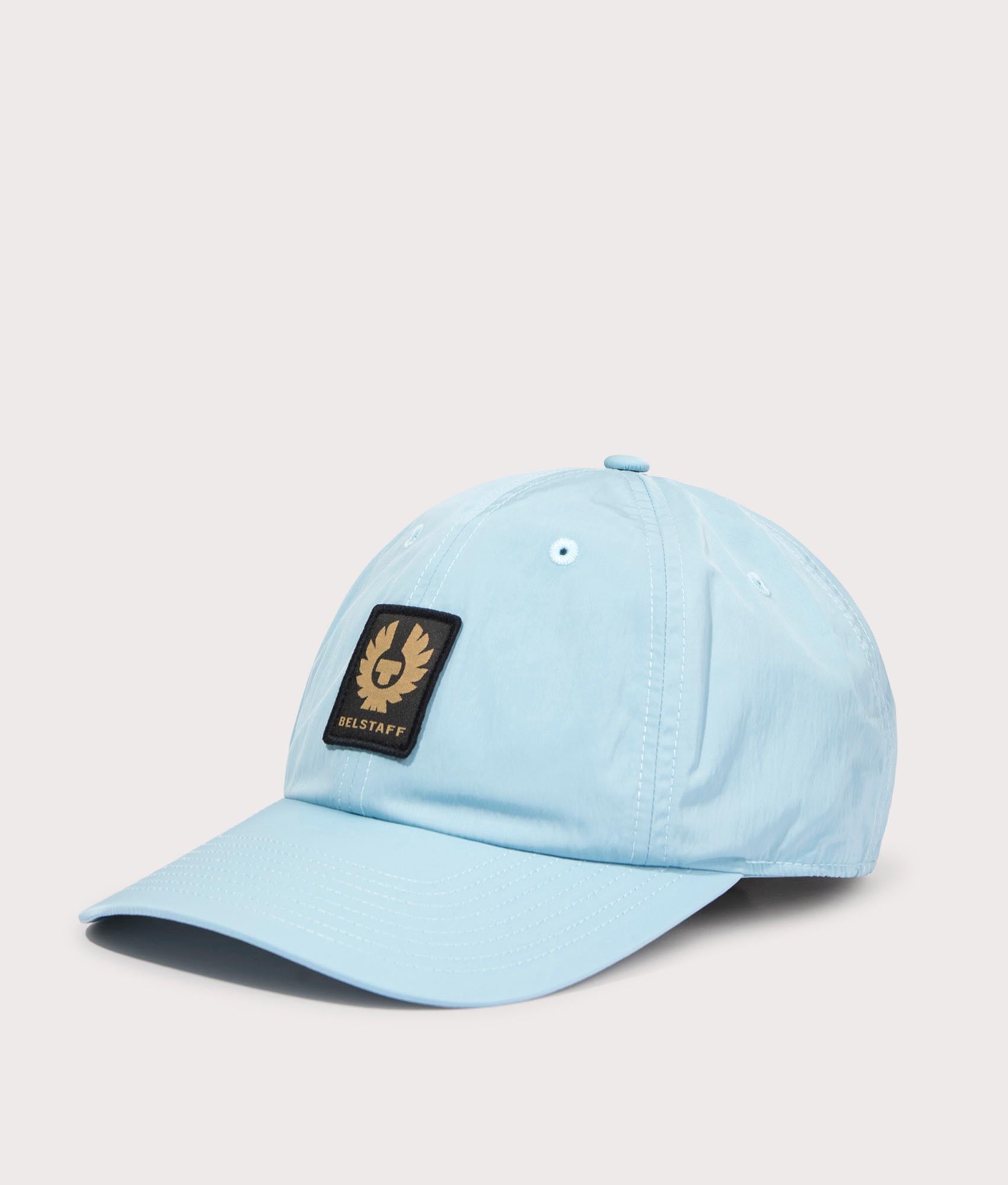 Phoenix Patch Cap in Skyline Blue by Belstaff. EQVVS Side Angle Shot.