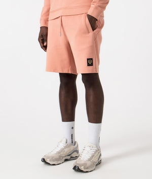 Belstaff Sweat Shorts in Rust Pink. EQVVS Side Angle Shot.