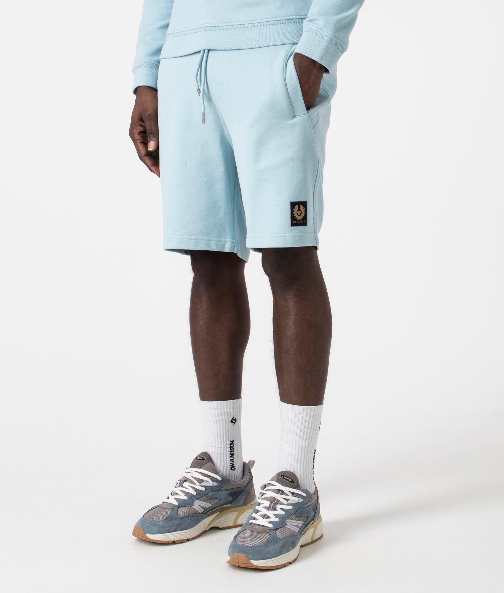 Belstaff Sweat Shorts in Skyline Blue. EQVVS Side Angle Shot.