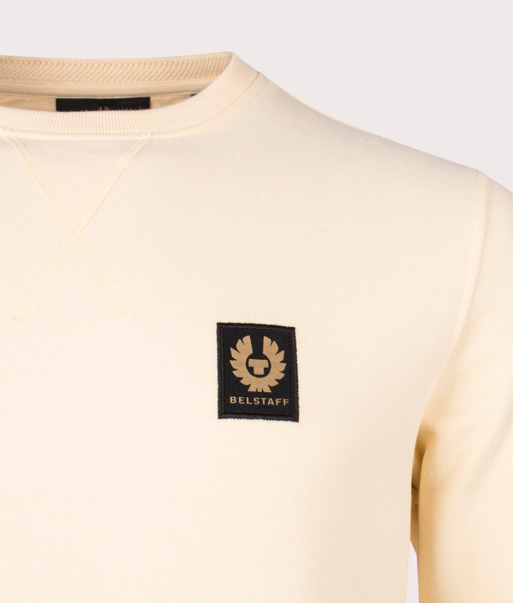 Belstaff Sweatshirt in yellow sand detail shot at EQVVS